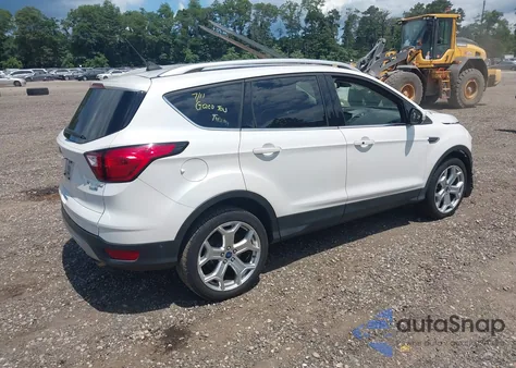 2019 Ford Escape Titanium z USA, uszkodzony, nr VIN 1FMCU9J90KUA84721